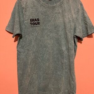 Taylor Swift Eras Tour t-shirt featuring the Caesars Superdome in New Orleans.